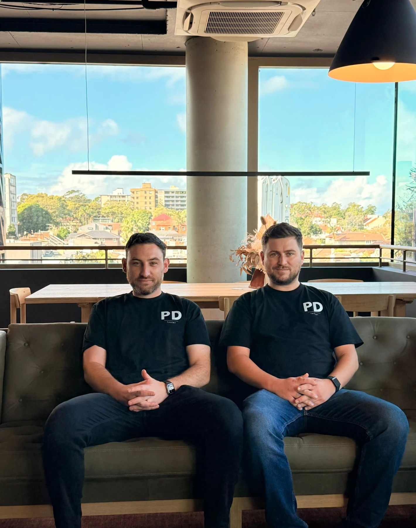 PD Talent founders Sean Donnelly and Lewis Perry sitting together.